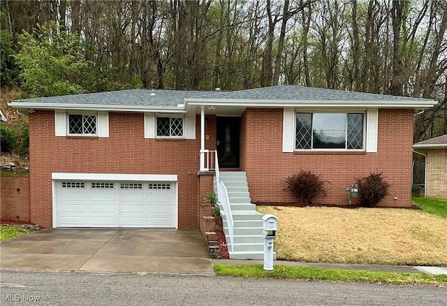 133 Bass Dr, Weirton, WV 26062 - single story home featuring brick siding, driveway, a shingled roof, and a garage
