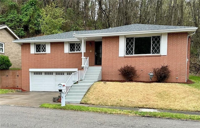 133 Bass Dr, Weirton, WV 26062 - ranch-style house featuring brick siding, an attached garage, aphalt driveway, and roof with shingles
