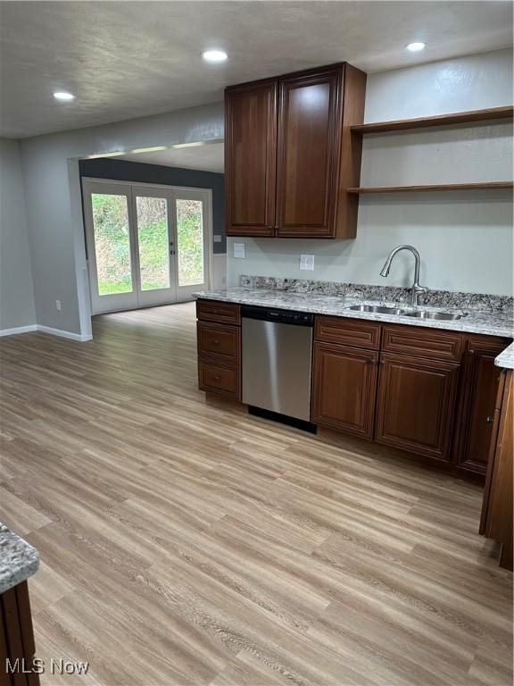 133 Bass Dr, Weirton, WV 26062 - kitchen featuring open shelves, light wood-style floors, baseboards, a sink, and dishwasher