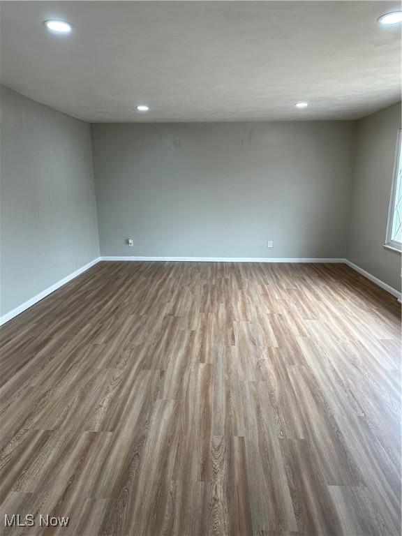 133 Bass Dr, Weirton, WV 26062 - empty room featuring recessed lighting, baseboards, and dark wood-style floors