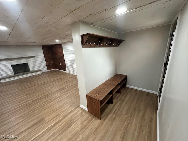 133 Bass Dr, Weirton, WV 26062 - mudroom with baseboards, wood finished floors, and a large fireplace