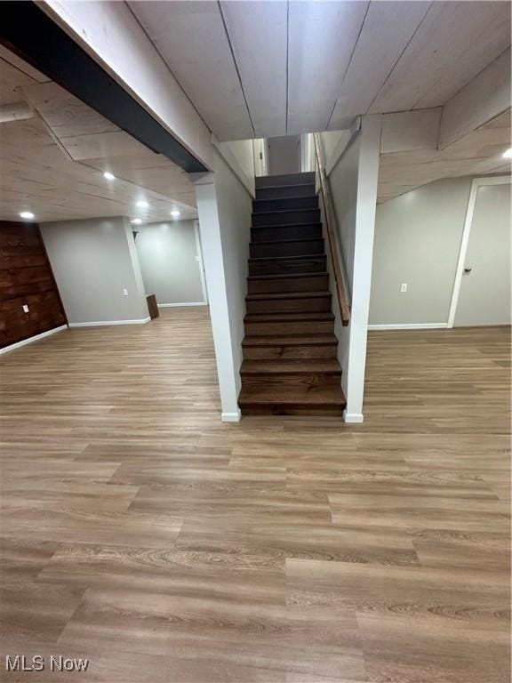 133 Bass Dr, Weirton, WV 26062 - stairway featuring baseboards and wood finished floors