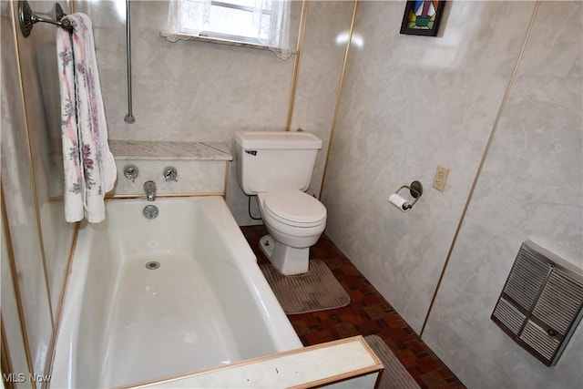 full bathroom featuring toilet, a tub to relax in, and visible vents