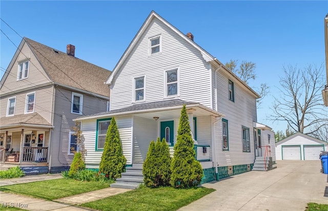 view of front of house with a garage, an outbuilding, covered porch, and a chimney