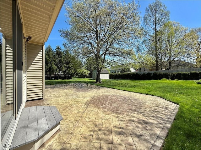 exterior space featuring an outdoor structure and a shed