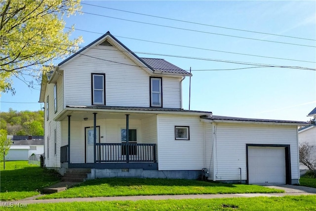 441 4th St, Bergholz, OH 43908 - view of front of home with a garage, covered porch, and a front yard