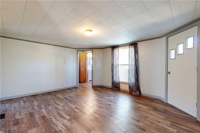 441 4th St, Bergholz, OH 43908 - empty room featuring visible vents, baseboards, and wood finished floors