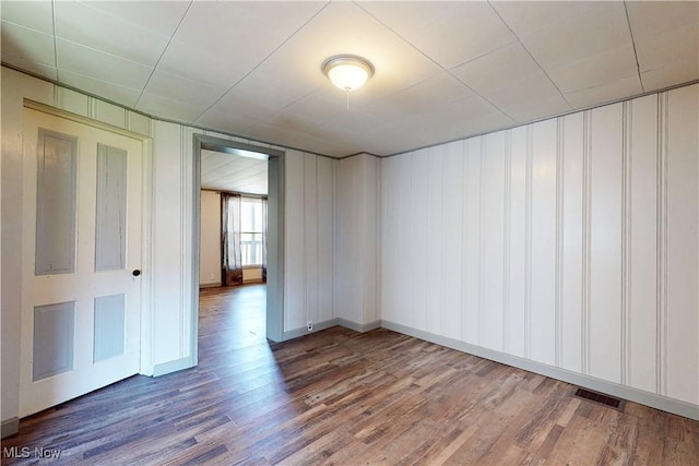 441 4th St, Bergholz, OH 43908 - unfurnished room featuring baseboards, wood finished floors, and visible vents