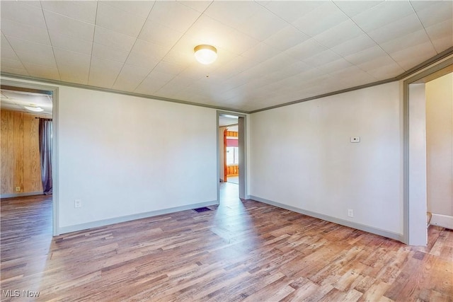 441 4th St, Bergholz, OH 43908 - empty room with baseboards and wood finished floors