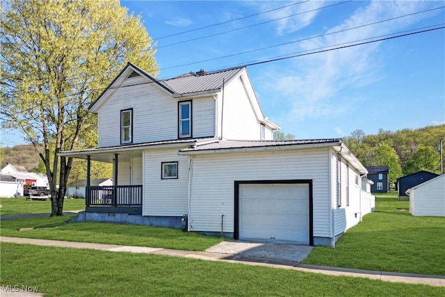 441 4th St, Bergholz, OH 43908 - exterior space featuring a lawn, a porch, and metal roof