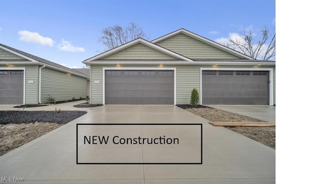 view of front of house with concrete driveway