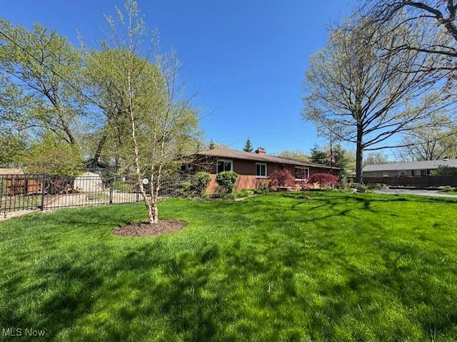 view of yard featuring fence