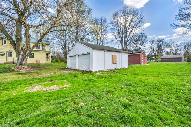 8935 S Main St, Windham, OH 44288 - exterior space with a garage and an outdoor structure