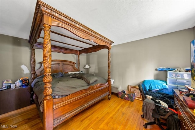 bedroom featuring hardwood / wood-style floors