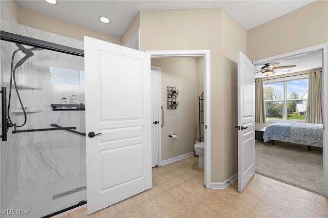 full bath with toilet, a marble finish shower, recessed lighting, baseboards, and a ceiling fan