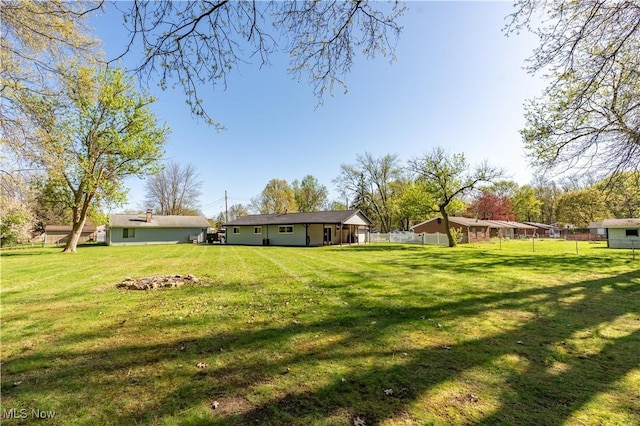 view of yard with fence