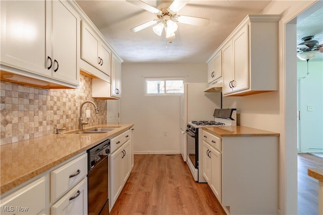 kitchen featuring ceiling fan, gas range, tasteful backsplash, dishwasher, and a sink