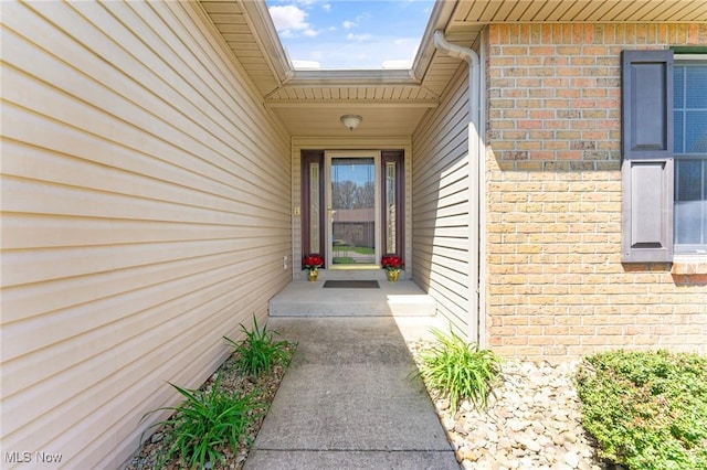 409 Pin Oak Pl, Campbell, OH 44405 - doorway to property featuring brick siding