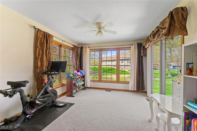 409 Pin Oak Pl, Campbell, OH 44405 - exercise room with baseboards, ceiling fan, carpet, and visible vents