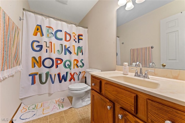 409 Pin Oak Pl, Campbell, OH 44405 - bathroom with toilet, shower / tub combo with curtain, tile patterned flooring, and vanity