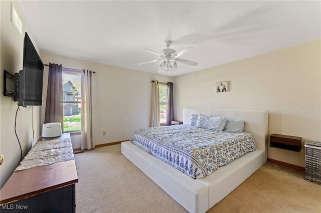 409 Pin Oak Pl, Campbell, OH 44405 - bedroom featuring light colored carpet, a ceiling fan, baseboards, and visible vents