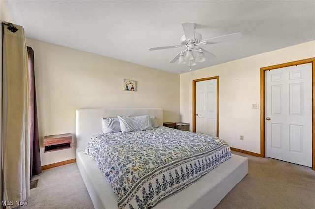 409 Pin Oak Pl, Campbell, OH 44405 - carpeted bedroom featuring baseboards and ceiling fan