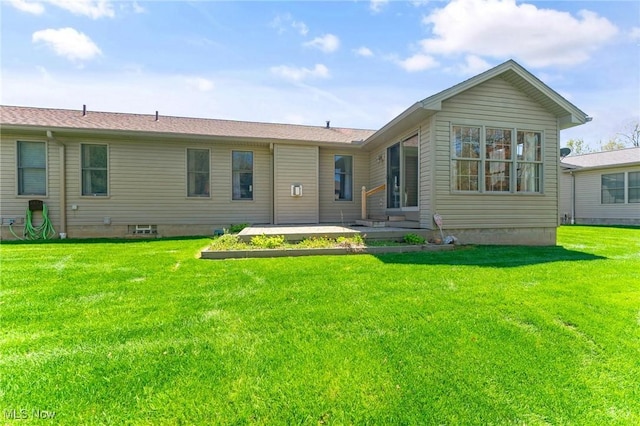 409 Pin Oak Pl, Campbell, OH 44405 - rear view of property featuring a patio area and a yard