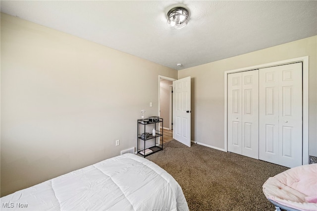 6084 Clay St, Thompson, OH 44086 - carpeted bedroom with baseboards and a closet