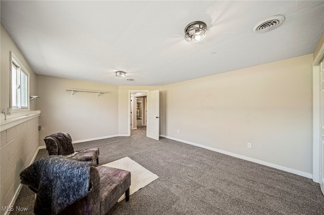 6084 Clay St, Thompson, OH 44086 - living area featuring baseboards, visible vents, and carpet