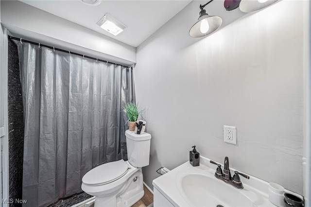 6084 Clay St, Thompson, OH 44086 - full bathroom featuring visible vents, toilet, baseboards, a shower with curtain, and a sink