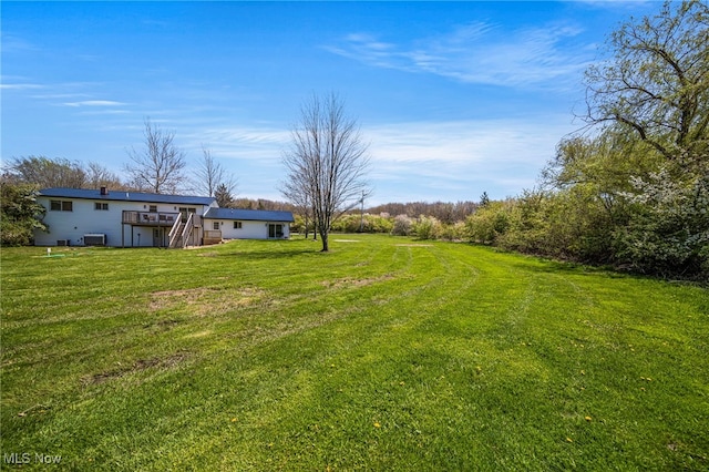 6084 Clay St, Thompson, OH 44086 - view of yard featuring a deck and cooling unit