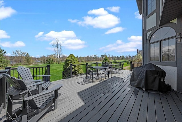 275 Camden Ln, Aurora, OH 44202 - deck with outdoor dining area and a yard