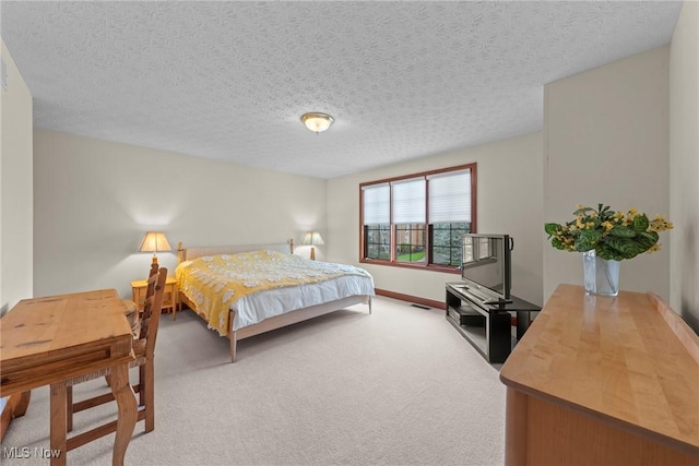 275 Camden Ln, Aurora, OH 44202 - carpeted bedroom with a textured ceiling