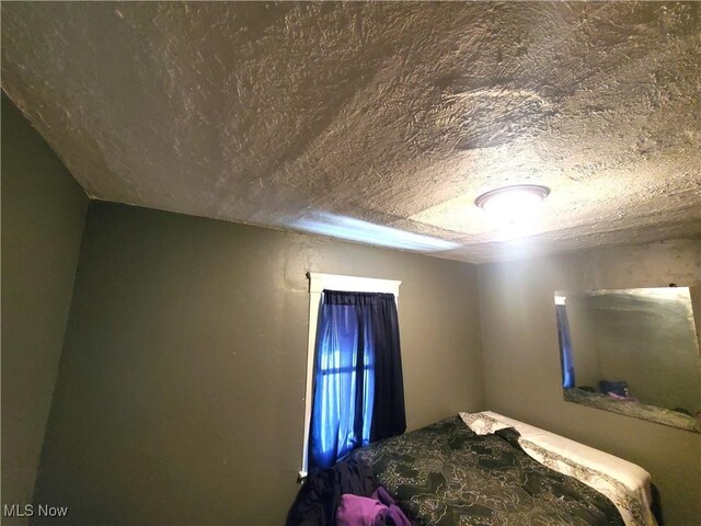 9615 Dunlap Ave, Cleveland, OH 44105 - bedroom featuring a textured ceiling