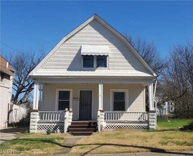 9615 Dunlap Ave, Cleveland, OH 44105 - view of front of home with a porch