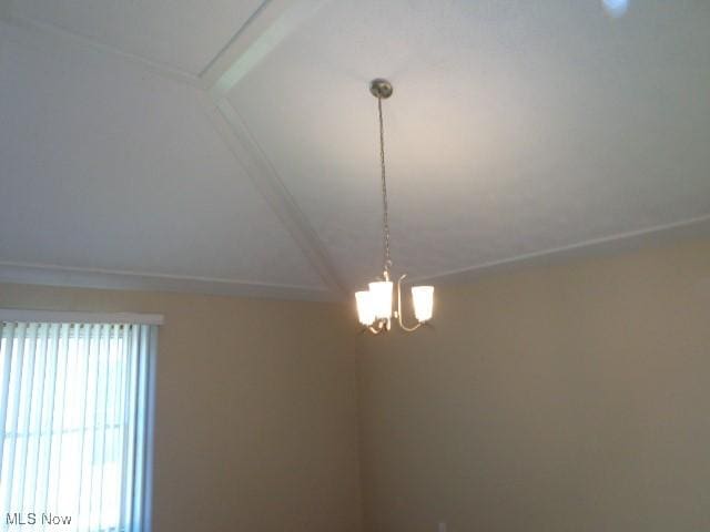 interior details with an inviting chandelier