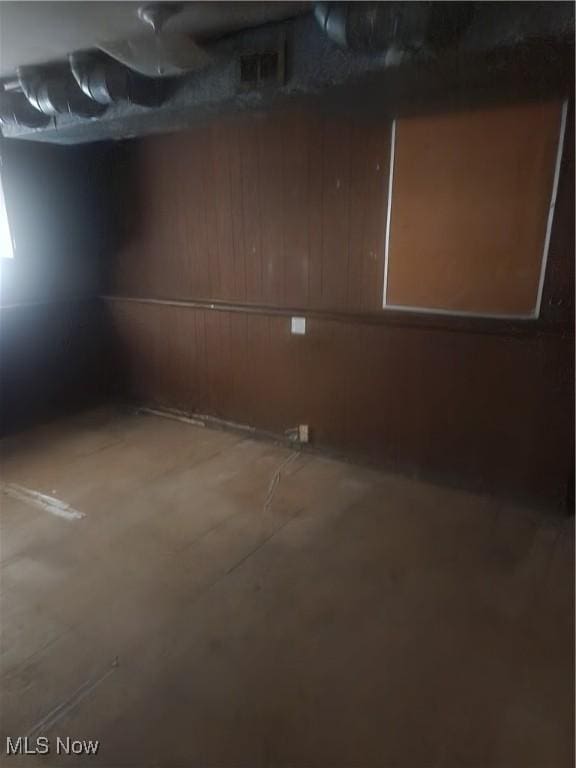 6876 Anthony Ln, Parma Heights, OH 44130 - unfinished below grade area with visible vents and wood walls