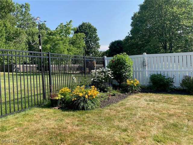 view of yard with fence