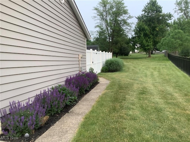 view of yard with fence