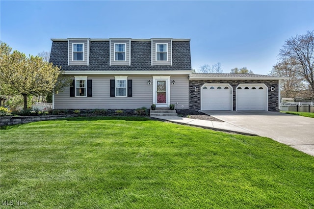 view of front of house featuring a front yard, roof with shingles, a garage, fence, and concrete driveway