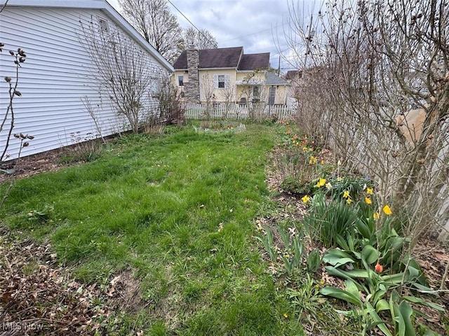 view of yard with fence