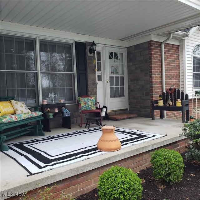 view of patio featuring covered porch