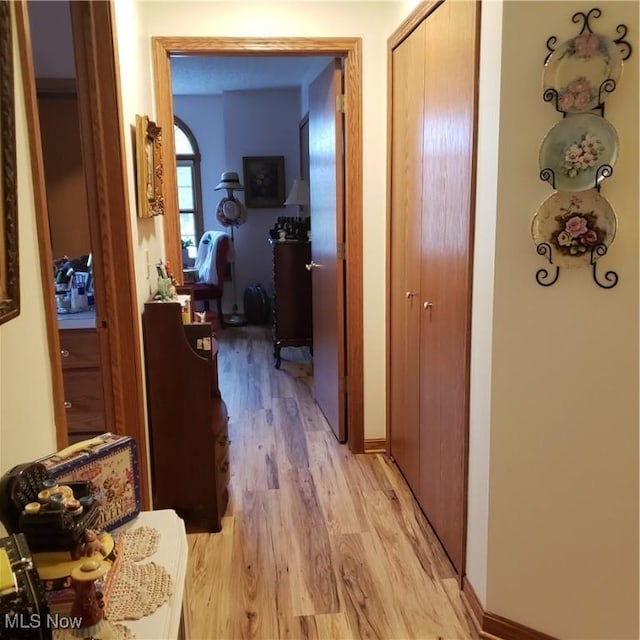 hall featuring light wood-type flooring