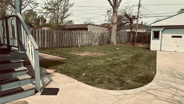 view of yard with an outdoor structure and fence