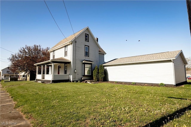 view of side of home featuring a yard