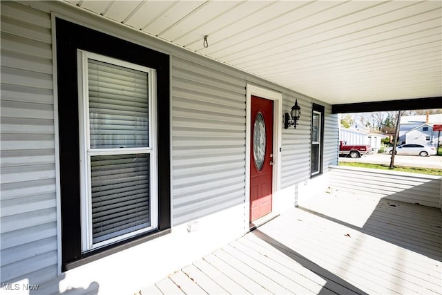 deck featuring covered porch
