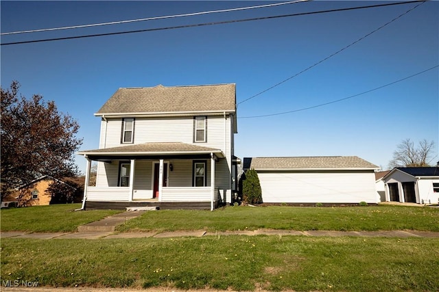 traditional-style house with a porch and a front lawn