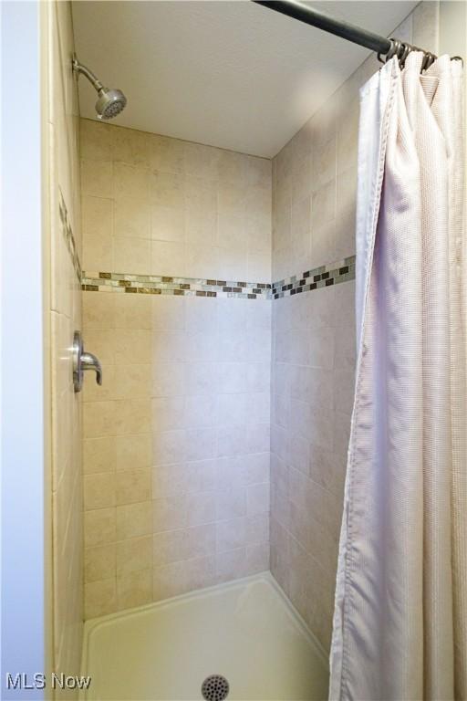 full bath with a stall shower
