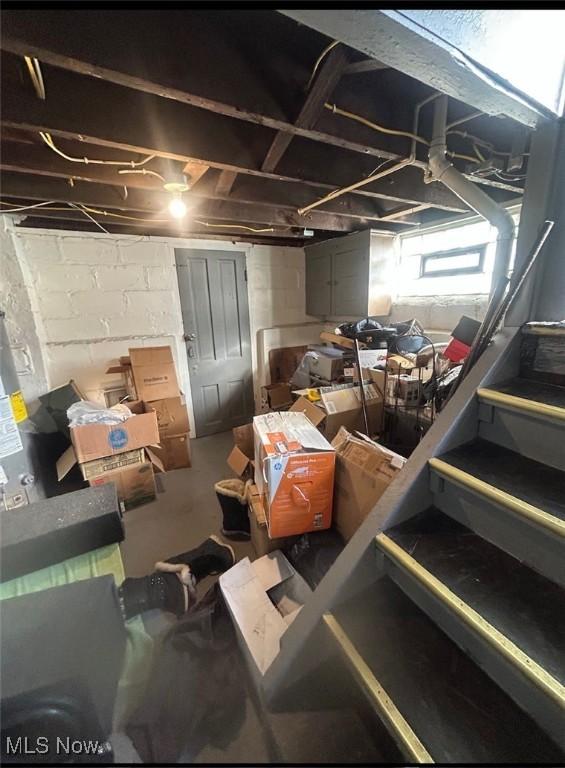 basement featuring water heater