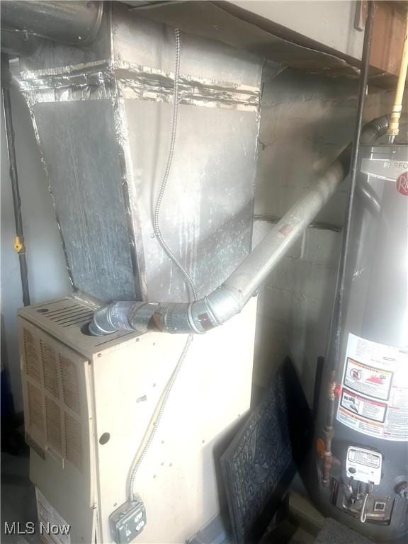 utility room with water heater